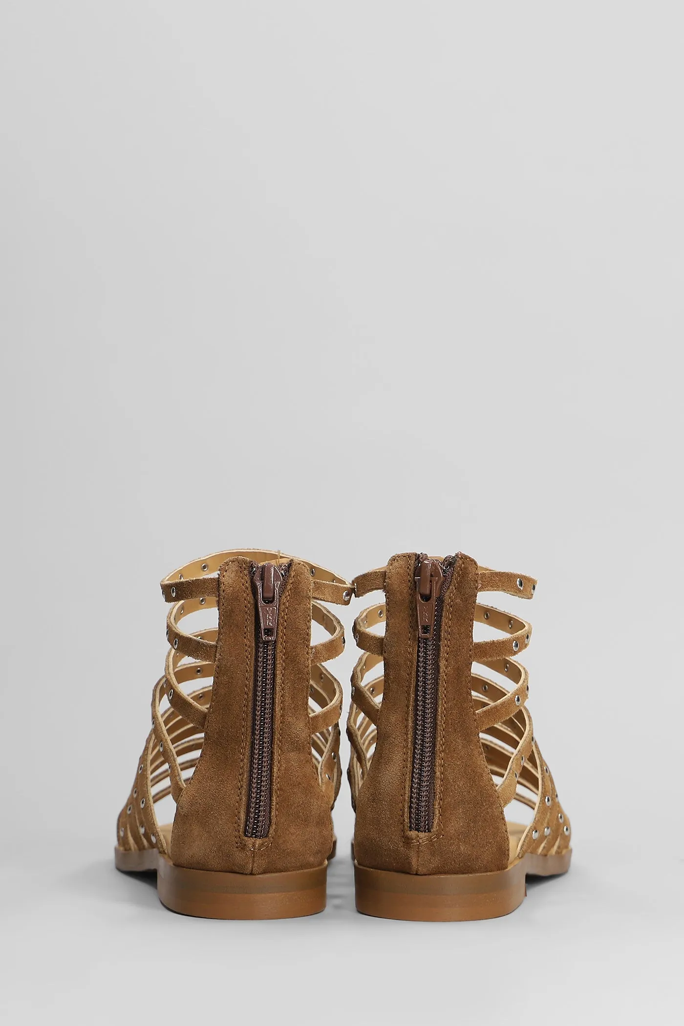 Flats in brown suede