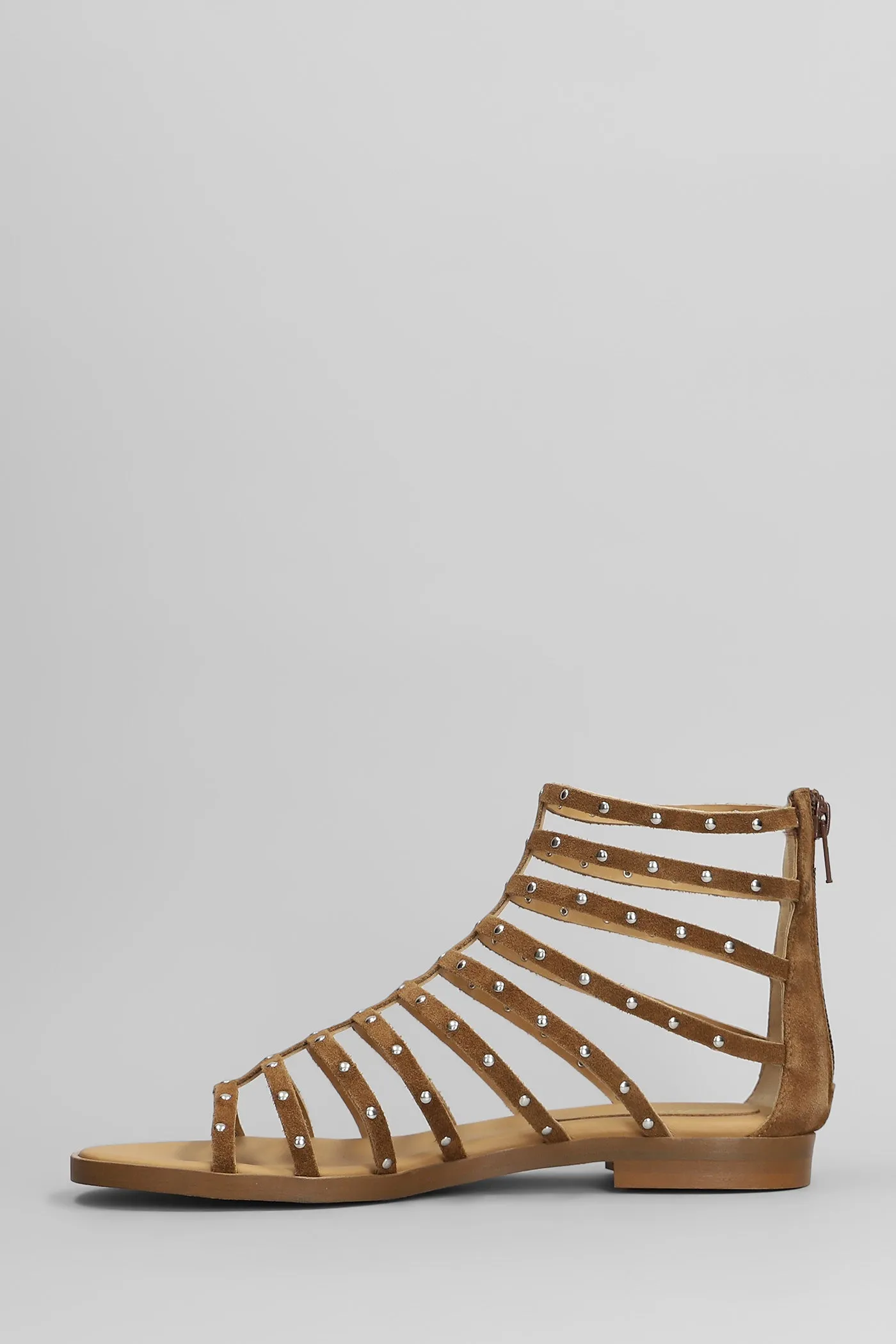 Flats in brown suede