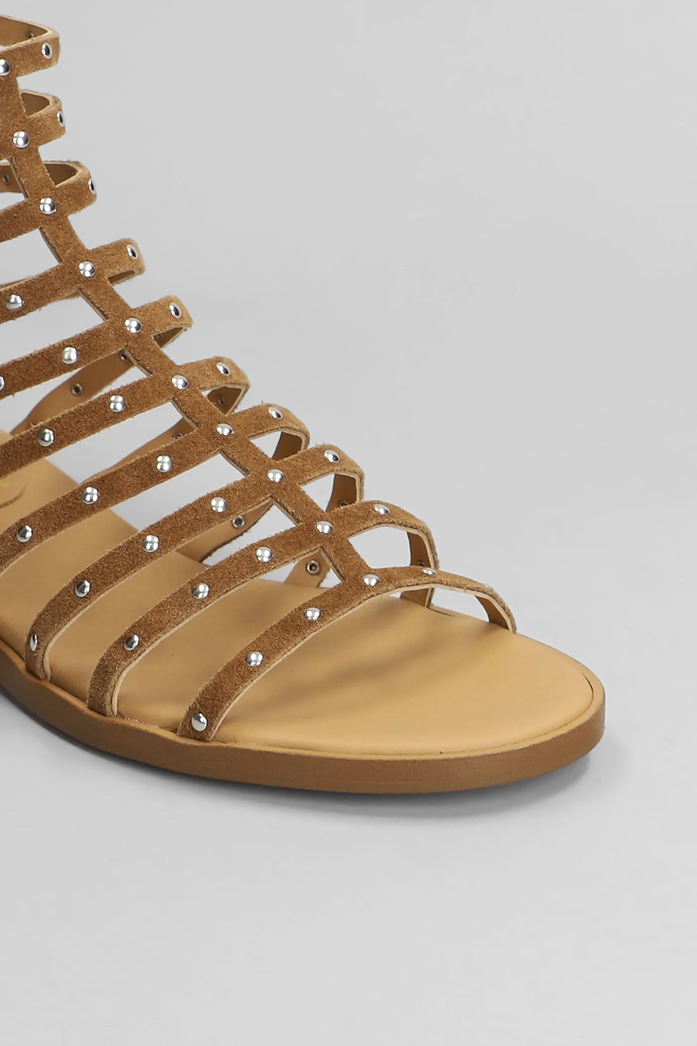 Flats in brown suede